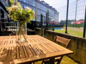Apartamento con jardín y piscina comunitaria